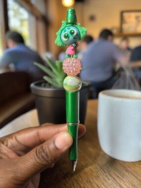 Handcrafted Green Beaded Character Top Pen